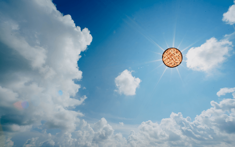 Pie in the sky with sun rays and clouds. Metaphor for high expectations.