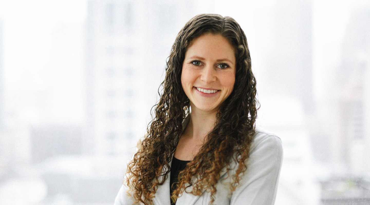 Kendra Perry, Next-Gen Consultant, smiling in a professional headshot.