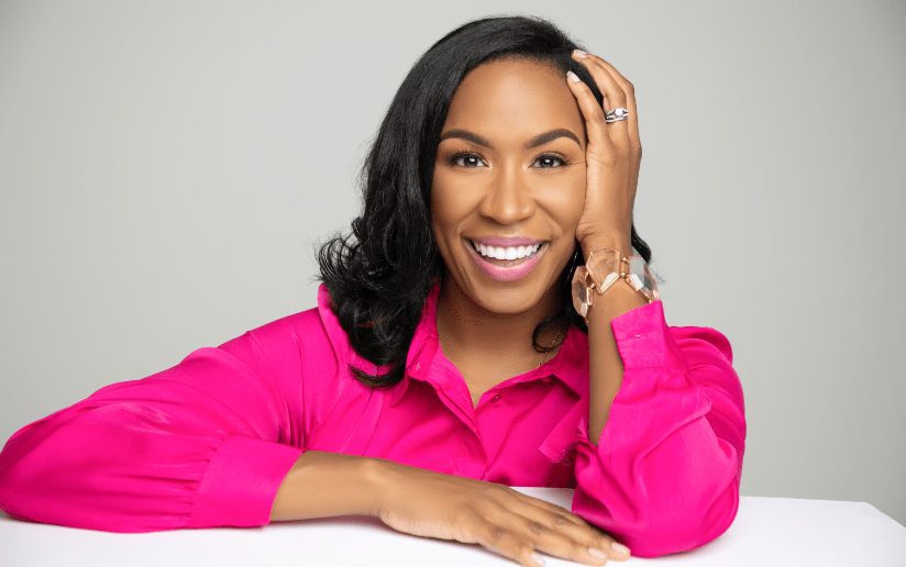 Keshawn Hughes, marketing expert, smiling confidently.