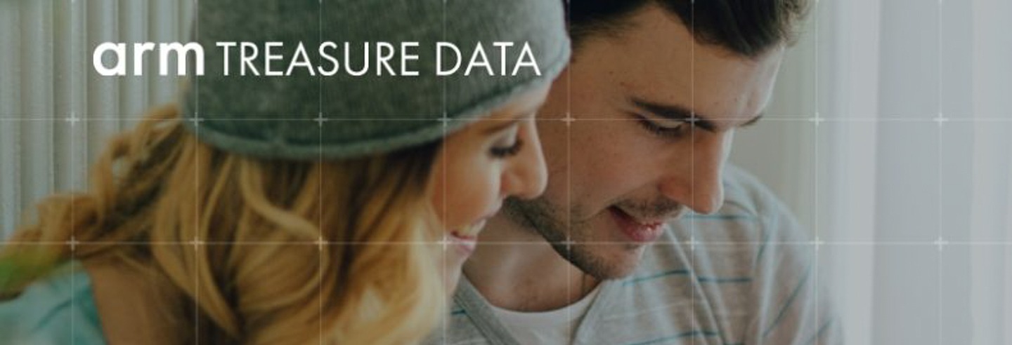 Couple looking at a screen, arm TREASURE DATA logo visible