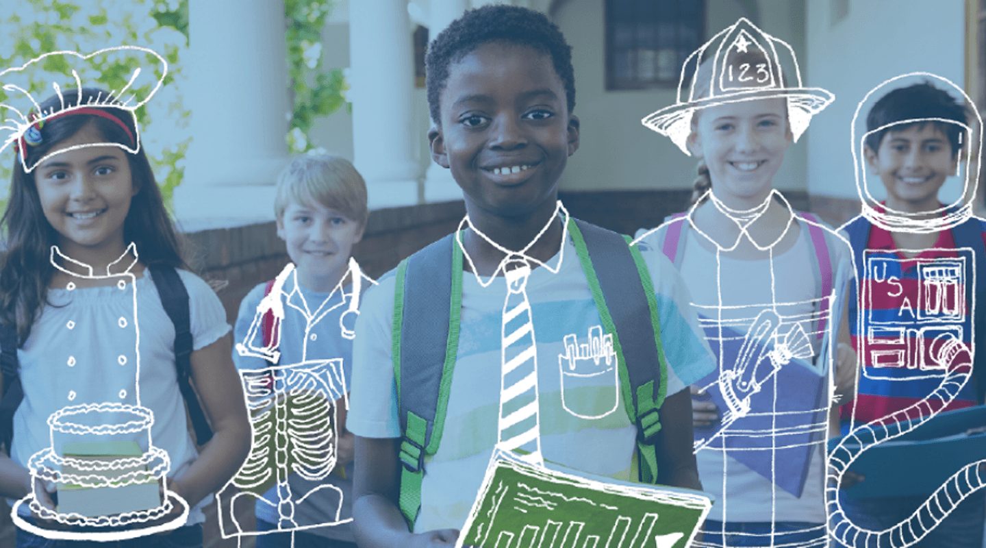 Children in career costumes smiling, representing future aspirations. Illuminate Education.